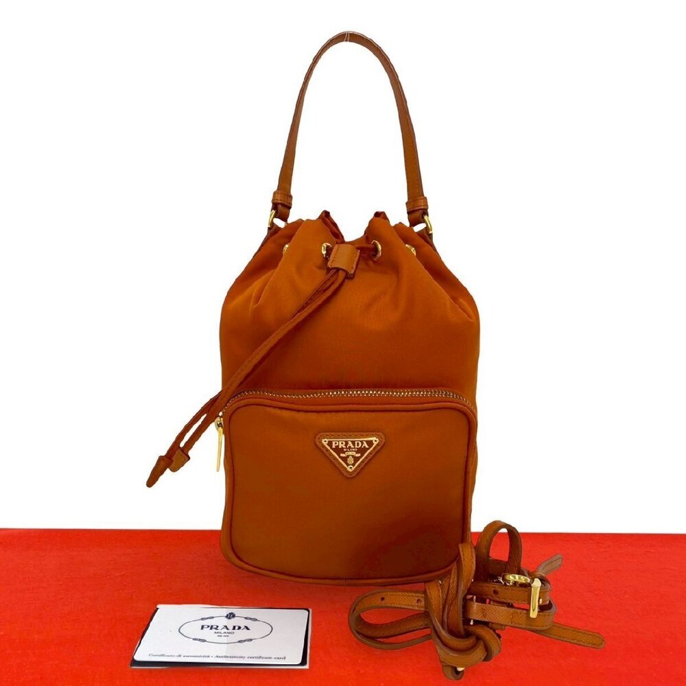 PRADA triangular Saffiano leather drawstring handbag shoulder bag orange